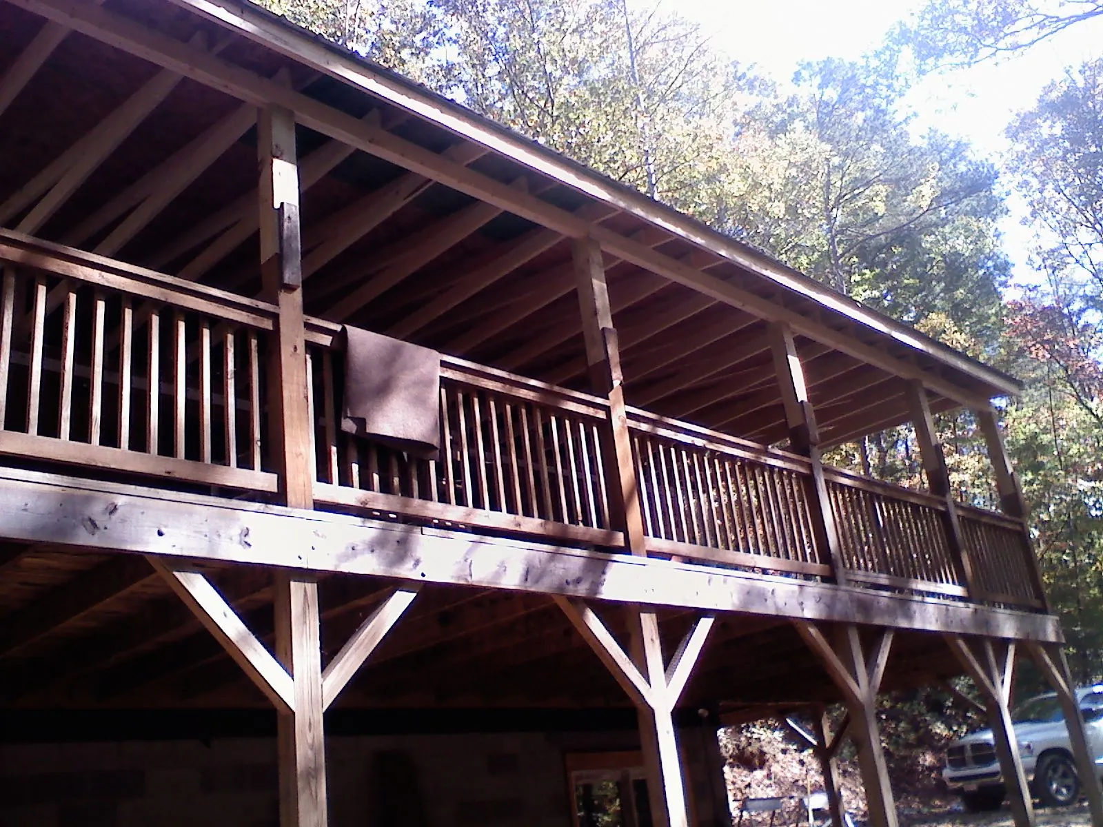 Timber framing under a new elevated porch and deck — Roof Leak Repair in Aledo by Roofing Brothers